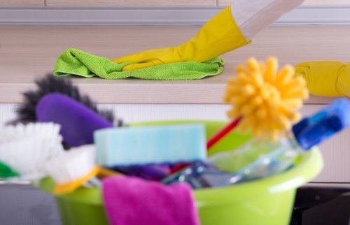 Cleaner preparing a safe workplace before starting cleaning tasks