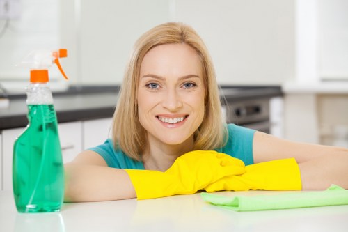 Local commercial carpet cleaner preparing equipment in Harrow