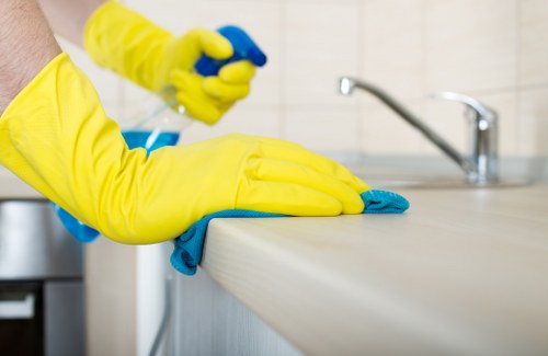 Detailed cleaning of surfaces and fixtures in a Harrow home