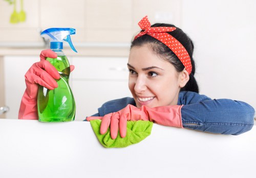 Local technician cleaning a carpet affected by pet urine in Harrow